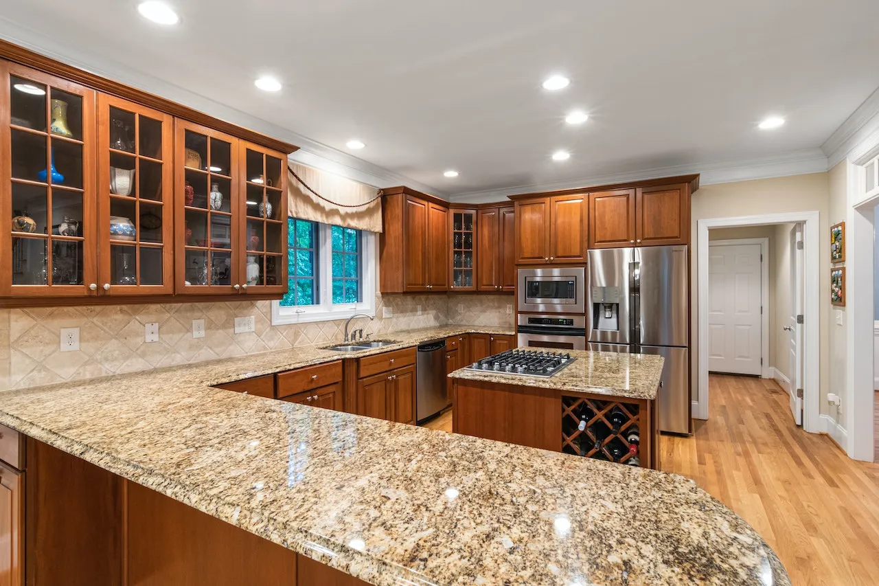 Close-up of polished granite countertop showing natural veining and crystal patterns